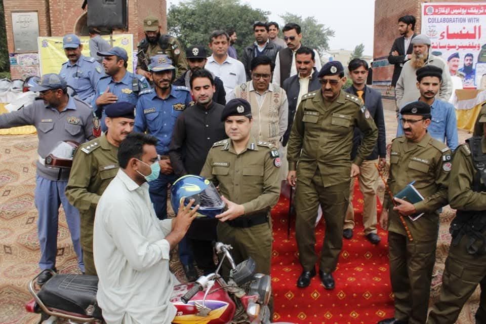 Al nisa working with district police during traffic awareness campaign
