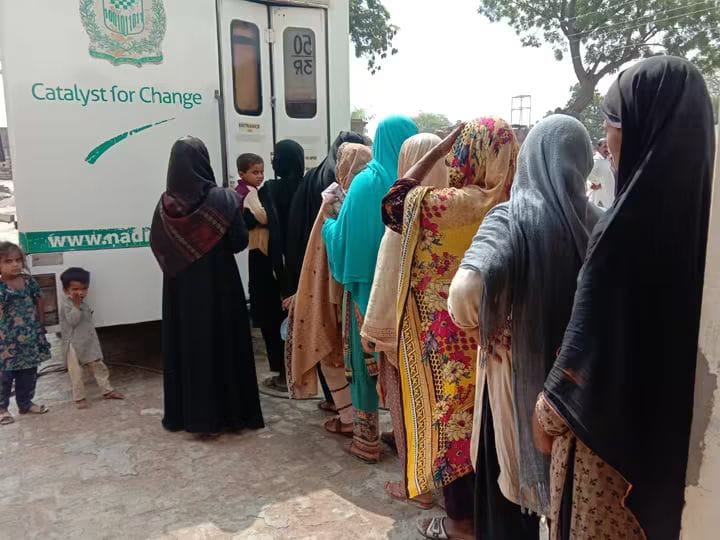 NADRA mobile making id cards of local women working in collaboration with Al-Nisa and election Commission of Pakistan